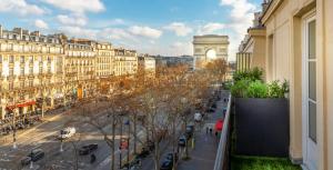 a view of a street in a city with buildings at Montfleuri in Paris
