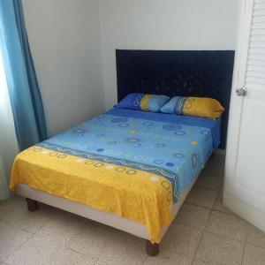 Ένα ή περισσότερα κρεβάτια σε δωμάτιο στο Boel Boutique Hostal