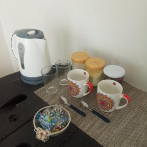 Příslušenství pro přípravu čaje a kávy v ubytování boel boutique 2