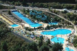 an aerial view of a pool at a resort at Twin House - Amarante in Amarante