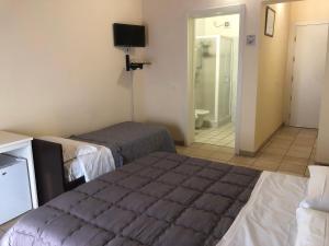 A bed or beds in a room at IL Borgo