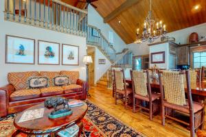 a living room with a couch and a table at Teton View Cabin in Jackson