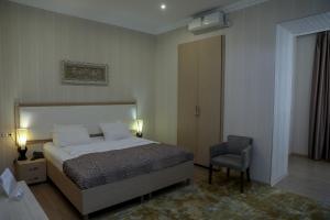 Letto o letti in una camera di Rustaveli Palace