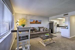 a living room with a couch and a kitchen at Sedona Escape Walk to Dining, 7 Mi to Uptown! in Sedona