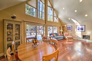 a living room with a wooden table and chairs at 4 Mi to Dtwn Truckee Tahoe Donner Home with Hot Tub in Truckee