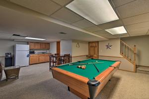 an office with a pool table in a room at Waterfront Fond du Lac Home on DeNeveu Lake! in Fond du Lac