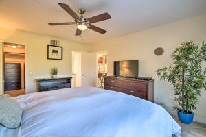 A bed or beds in a room at Updated Palm Desert Escape with Resort Amenities!