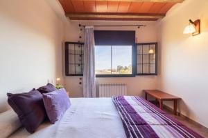 A bed or beds in a room at Lo Guaret. Még 37 kép