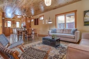 a living room with a couch and a table at The Davenport - Meredith Lodging in Bend