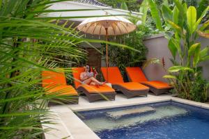 Foto de la galería de Bali Komang Guest House Sanur en Sanur