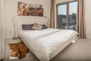 Posteľ alebo postele v izbe v ubytovaní Luxury Downtown Apartments