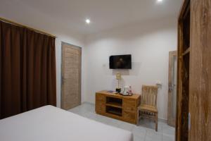 Imagen de la galería de Bali Komang Guest House Sanur, en Sanur