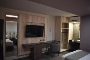 Voodi või voodid majutusasutuse Hotel Frontiere Tijuana toas