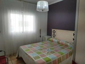 Postel nebo postele na pokoji v ubytování Zona Centro II Orangecosta