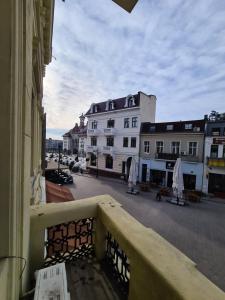 a view of a street from a balcony of a building at ZIG ZAG apartment 4- Old Town in Constanţa
