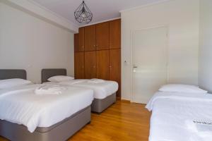 Posteľ alebo postele v izbe v ubytovaní Two Bedroom Apartment in Chalandri with Balcony