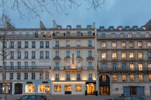 a large white building with many windows at Montfleuri in Paris