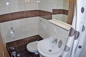 Kúpeľňa v ubytovaní Apartment Luciana + 23 fotografií