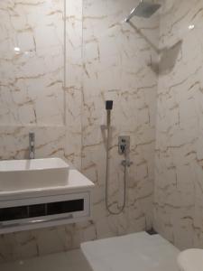 Koupelna v ubytování Alsalam Syariah Guesthouse