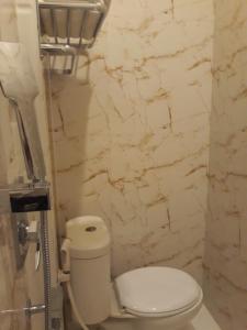 Koupelna v ubytování Alsalam Syariah Guesthouse
