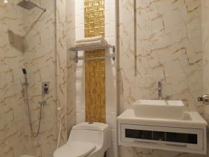 Koupelna v ubytování Alsalam Syariah Guesthouse