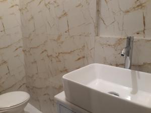 Koupelna v ubytování Alsalam Syariah Guesthouse