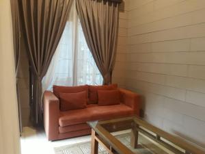 Posezení v ubytování Alsalam Syariah Guesthouse