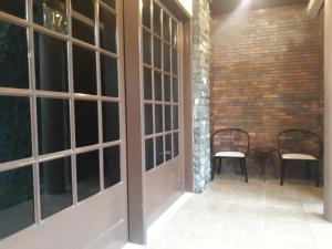 Posezení v ubytování Alsalam Syariah Guesthouse