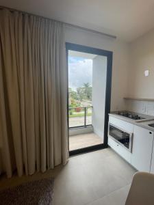 A cozinha ou cozinha compacta de Village dos Gerânios
