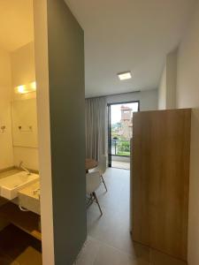 Cama ou camas em um quarto em Village dos Gerânios