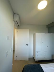 Cama ou camas em um quarto em Village dos Gerânios