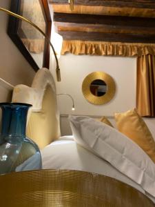 Postel nebo postele na pokoji v ubytování Ca' San Giorgio B&B