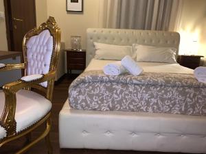 Ένα ή περισσότερα κρεβάτια σε δωμάτιο στο VILLA MASI Rental Rooms
