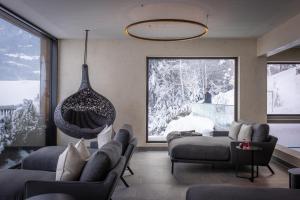 Posezení v ubytování Das Kaltenbach - ApartHotel