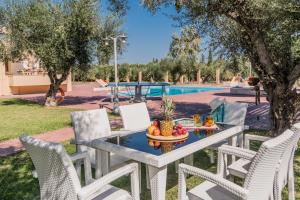 The swimming pool at or close to Astarte Villas - Istar Villa with Tennis Court