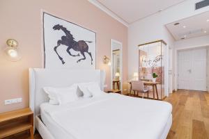 Postel nebo postele na pokoji v ubytování Apartamenty Bracka 6