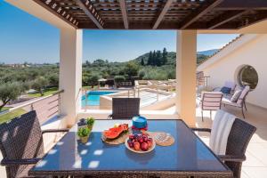 The swimming pool at or close to Astarte Villas - Istar Villa with Tennis Court