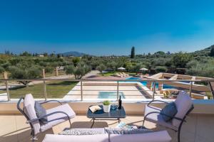 The swimming pool at or close to Astarte Villas - Istar Villa with Tennis Court