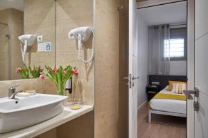 Koupelna v ubytování Lugaris Rambla Apartments