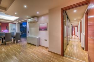 A television and/or entertainment centre at Astarte Villas - Istar Villa with Tennis Court