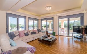 A seating area at Astarte Villas - Istar Villa with Tennis Court