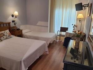 Postel nebo postele na pokoji v ubytování Arha Villa de Suances - Antiguo Albatros
