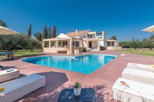 The swimming pool at or close to Astarte Villas - Istar Villa with Tennis Court