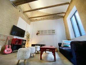 TV a/nebo společenská místnost v ubytování ECO Hostel