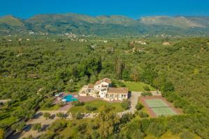 an aerial view of a house in the mountains at Astarte Villas - Istar Villa with Tennis Court in Makhairádhon