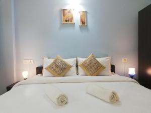 Postelja oz. postelje v sobi nastanitve Spectrum Hub beach side Studio Apartment - Candolim - Goa