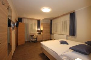 Krevet ili kreveti u jedinici u okviru objekta Pension Central Semmering