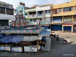 a building with a colorful in a city at AMINA LODGE in Port Blair