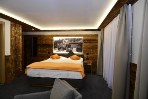 Postel nebo postele na pokoji v ubytování Hotel Elite