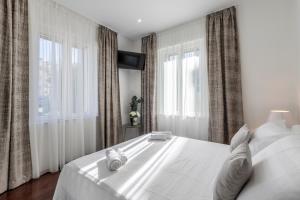 Posteľ alebo postele v izbe v ubytovaní Villa Meri very central and beautiful apartment